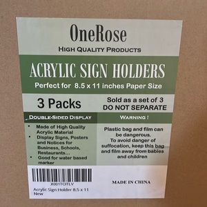 3 New in the box sign holders.